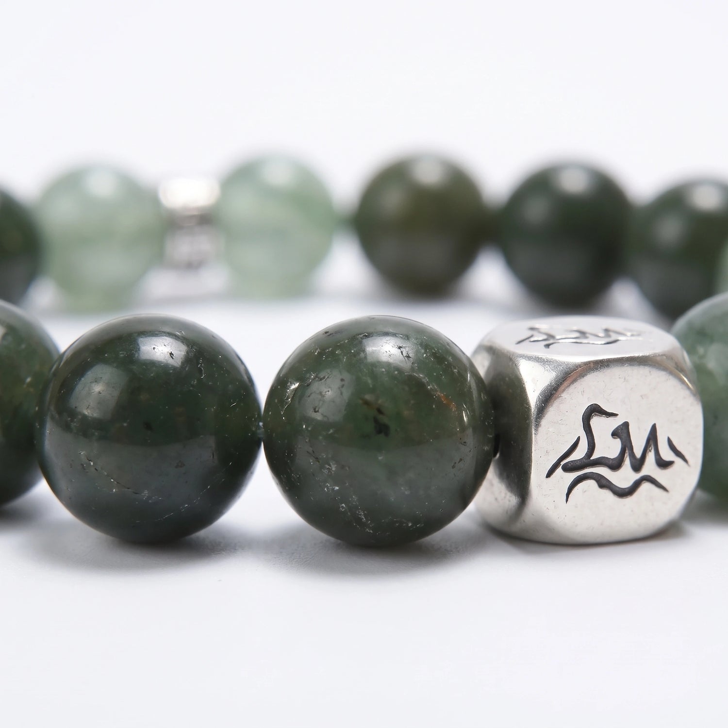 Aegis Wood bracelet macro detail, Nephrite Jade and Green Rutilated Quartz — Leymen Jewels