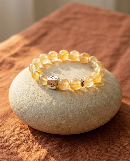 Bastion earth crystal bracelet — yellow hematoid and golden rutilated quartz — on natural stone — Leymen Jewels