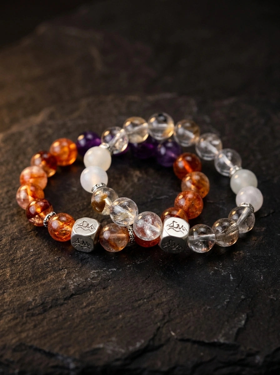 Verity and Ember crystal bracelets stacked on dark stone, citrine, amethyst, quartz — Leymen Jewels