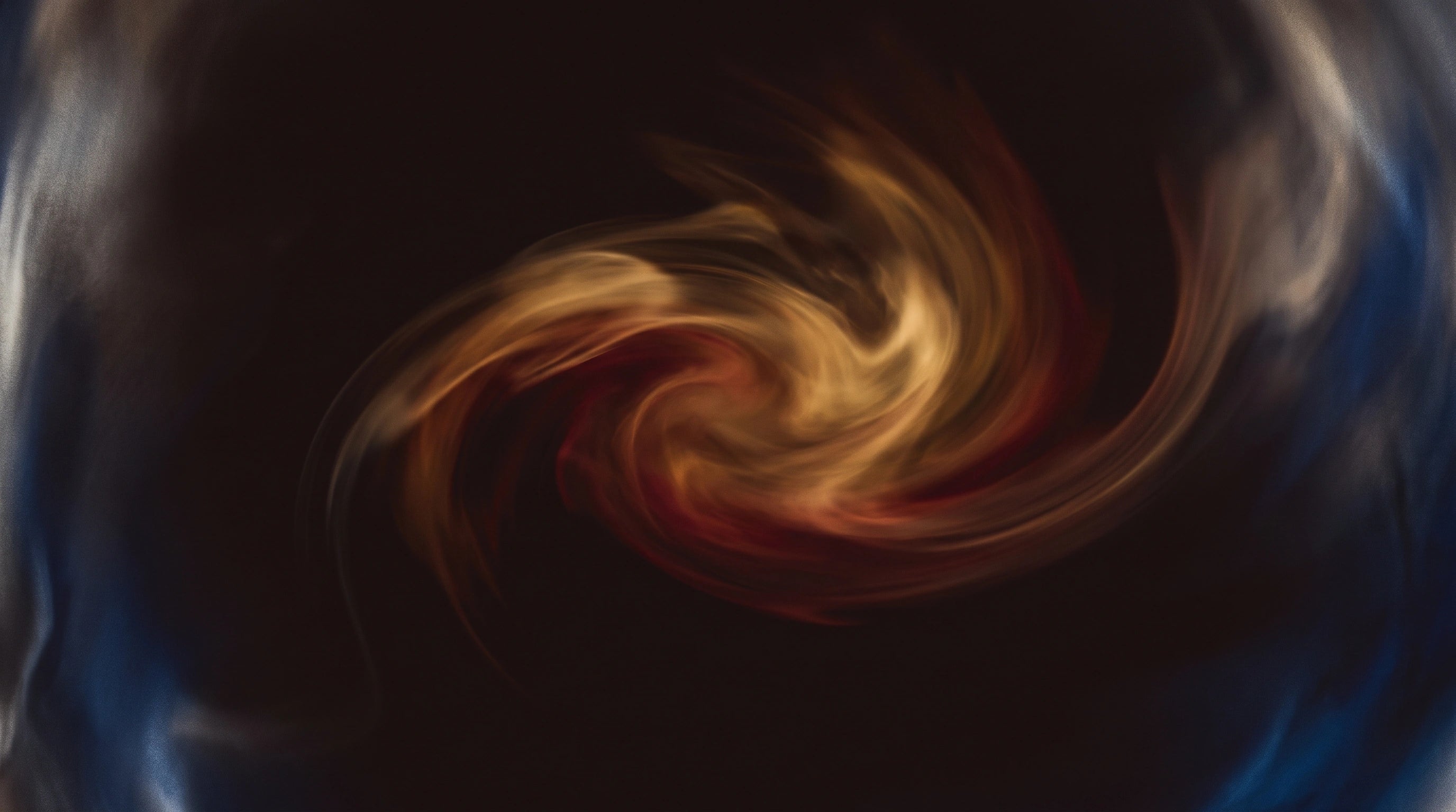 Abstract warm gold and amber banner representing the 2026 Fire Horse year crystal selection — Leymen Jewels