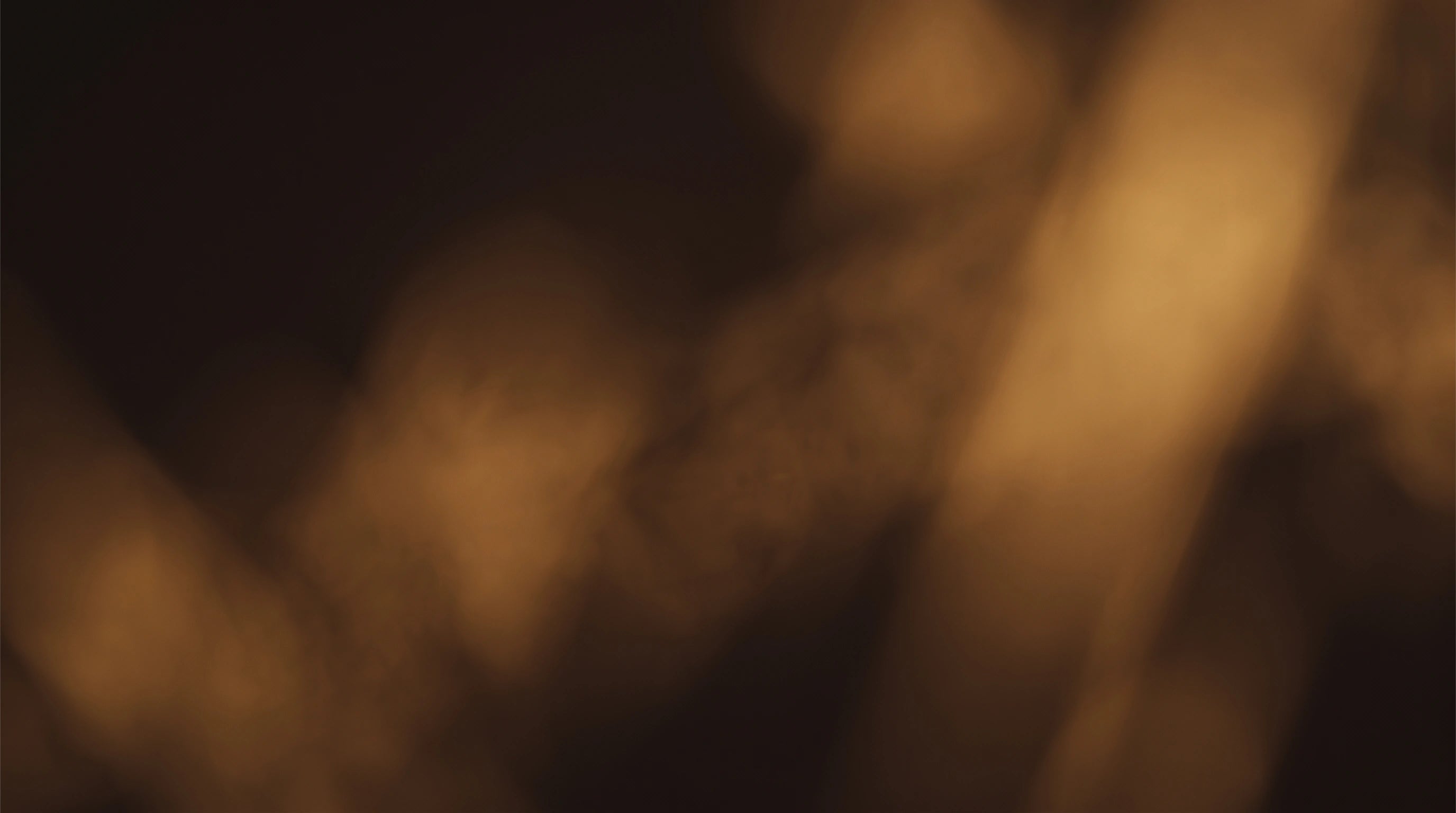 Abstract golden banner representing Earth element — Leymen Jewels