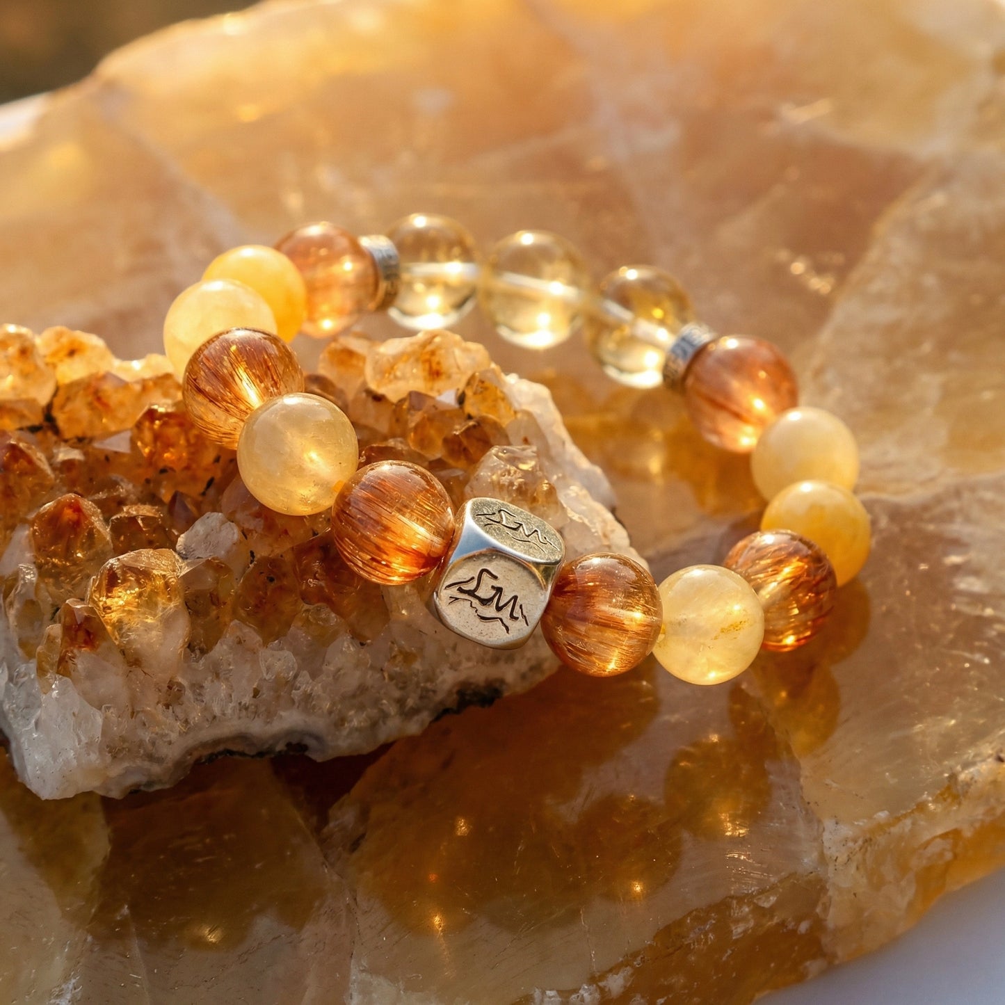 Forge earth crystal bracelet — citrine and copper rutilated quartz — on raw crystal cluster — Leymen Jewels