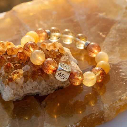 Forge earth crystal bracelet — citrine and copper rutilated quartz — on raw crystal cluster — Leymen Jewels