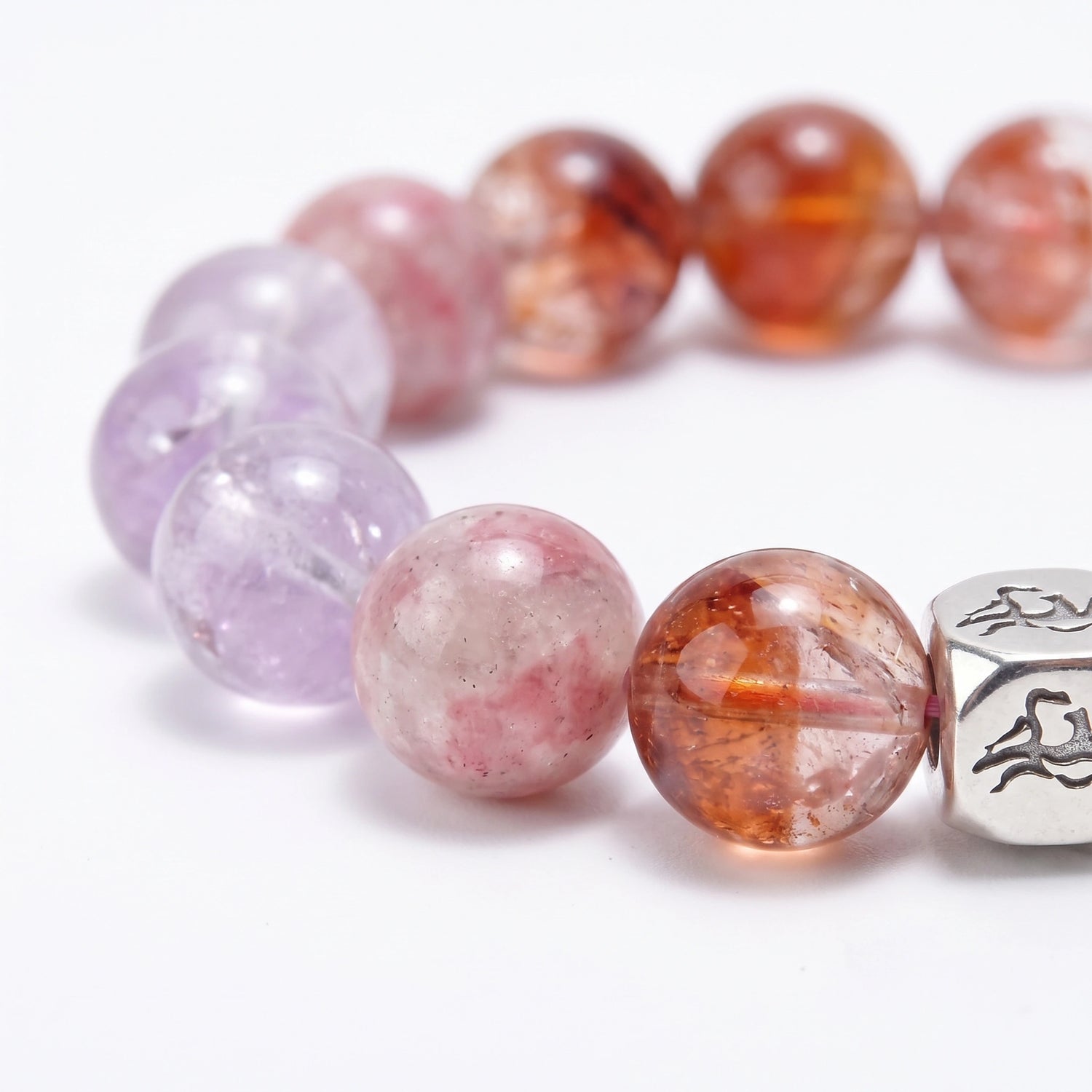 Kindle Fire bracelet macro detail, Lavender Amethyst, Rhodonite, and Red Phantom Quartz — Leymen Jewels