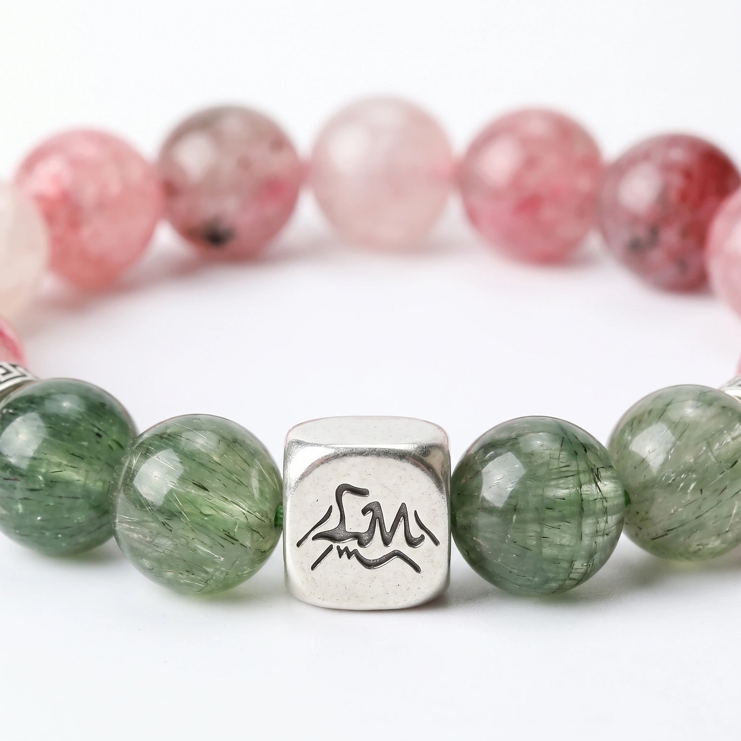 Phoenix Fire bracelet macro detail, Rhodonite and Green Rutilated Quartz — Leymen Jewels