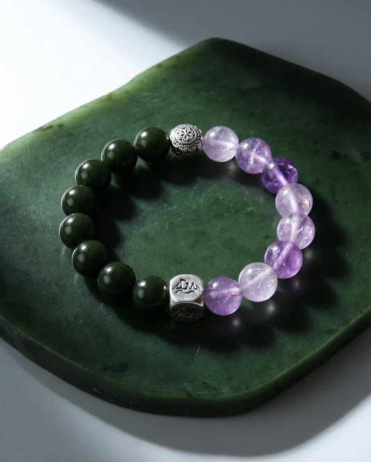 Seren wood crystal bracelet — nephrite jade and lavender amethyst — on polished nephrite jade dish — Leymen Jewels