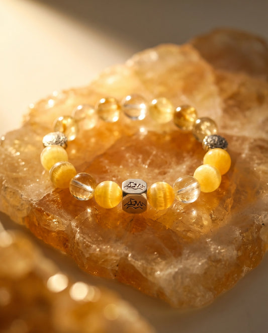 Solaris Vein earth crystal bracelet — citrine and golden rutilated quartz — on raw citrine cluster — Leymen Jewels